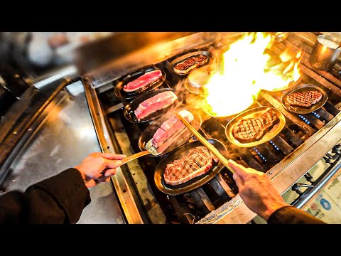 POV: Steak Chef Grilling Steak On a Hot Iron Plate
